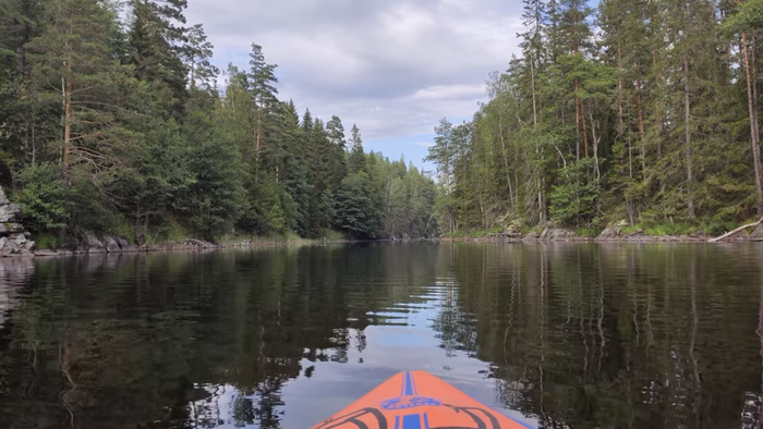 Our inflatable boat on one of Sweden’s endless lakes — the best travel decision we made